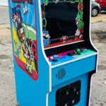 Mario Brothers, plays Super Mario Also, WITH LOTS OF NEW PARTS-LOOKS AND PLAY LIKE-HEAVY DUTY, COIN OPERATED, COMMERCIAL GRADE WITH FREE PLAY OPTION A NEW GAME-
