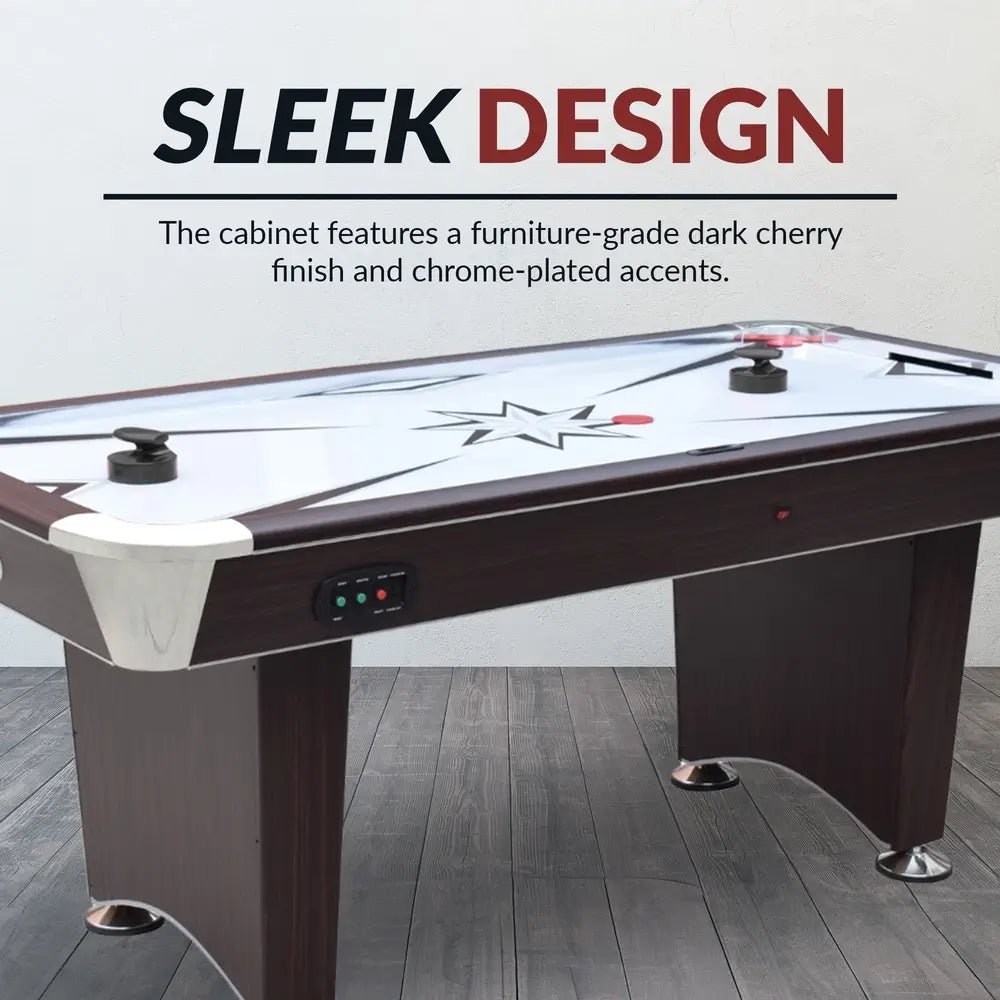 Close-up of Midtown II 6-ft air hockey table showing starburst playfield and blower vents
