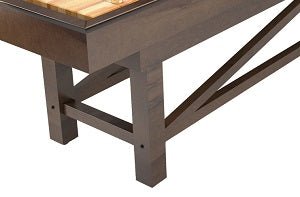 Close-up of Champion Sheffield 22' Shuffleboard Table leg with metal supports and tabletop.
